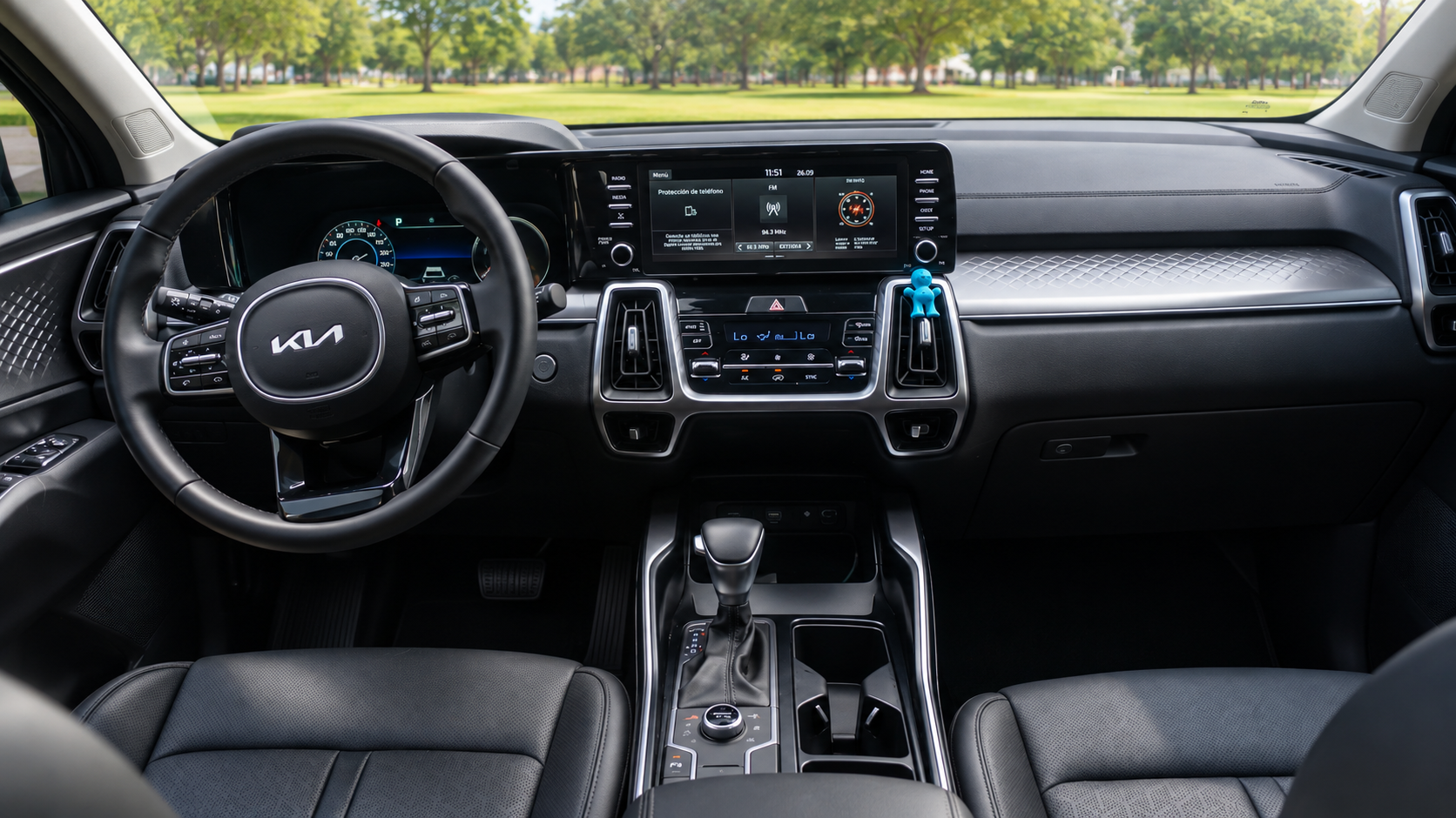 Interior del Kia Sorento: volante, tablero, pantalla central y consola